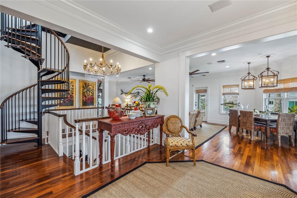 13310 Anglers Way Placida, FL 33946 - Photo 4 of 43 a view of a dining room with furniture window and wooden floor