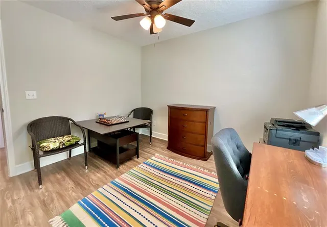 a living room filled with furniture and a table