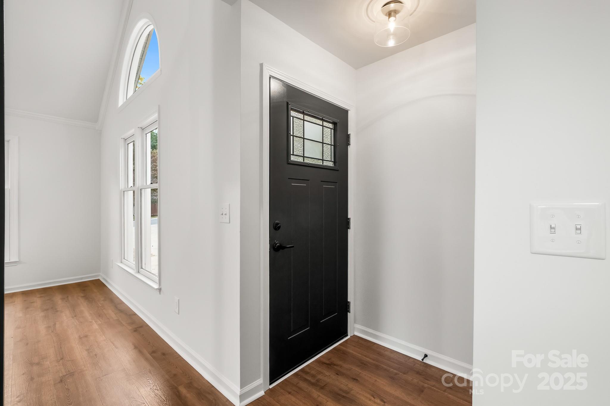 101 Banks Ridge Road Fort Mill, SC 29715 - Photo 12 of 34 a view of an entryway with wooden floor