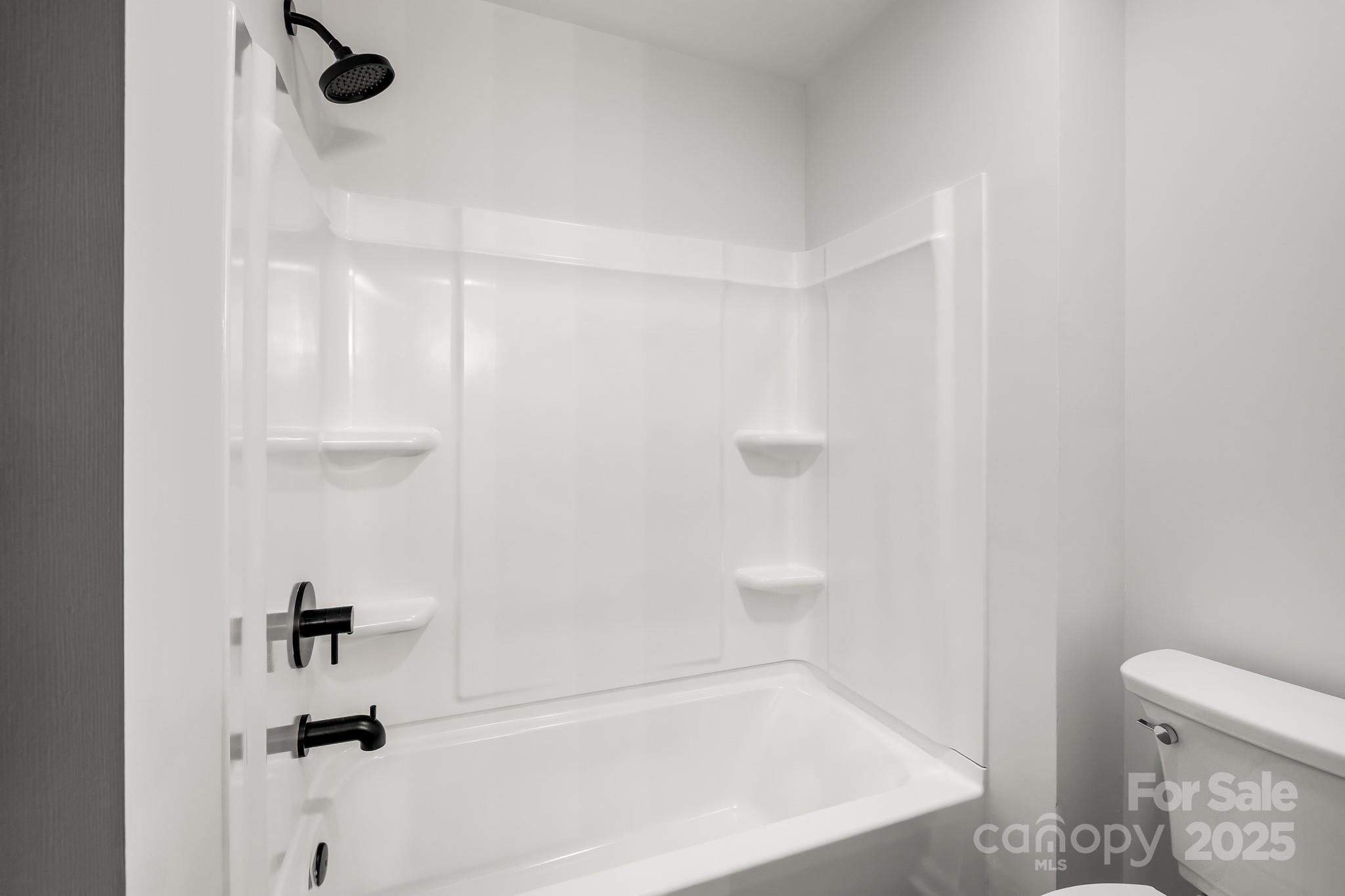 101 Banks Ridge Road Fort Mill, SC 29715 - Photo 16 of 34 a bathroom with a bathtub