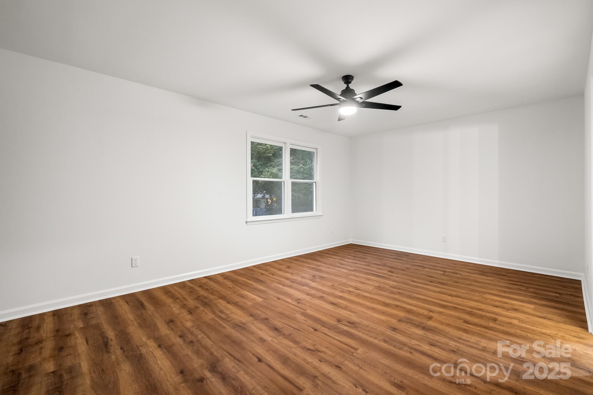 101 Banks Ridge Road Fort Mill, SC 29715 - Photo 20 of 34 wooden floor in an empty room with a window