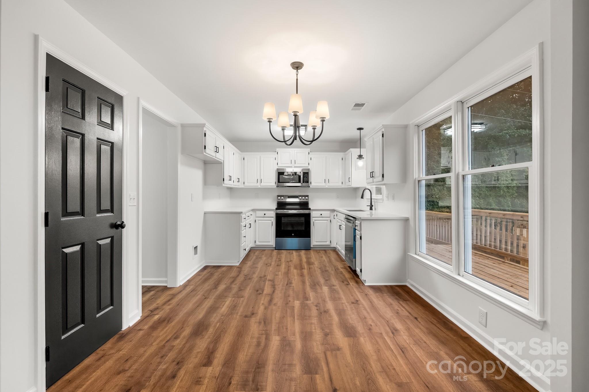 101 Banks Ridge Road Fort Mill, SC 29715 - Photo 3 of 34 a view of a kitchen from the hallway