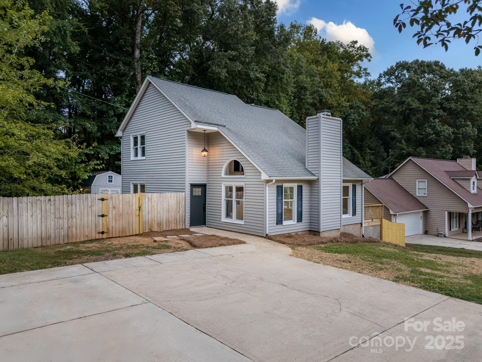 101 Banks Ridge Road Fort Mill, SC 29715 - Photo 8 of 34 a view of a house with a yard