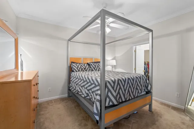 a view of a bedroom with furniture and staircase