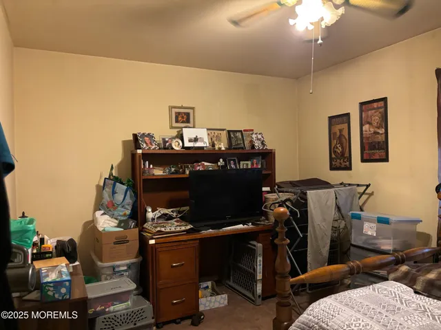 a view of a workspace with furniture