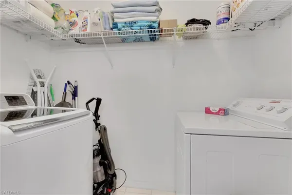 a bathroom with a sink toilet and a mirror