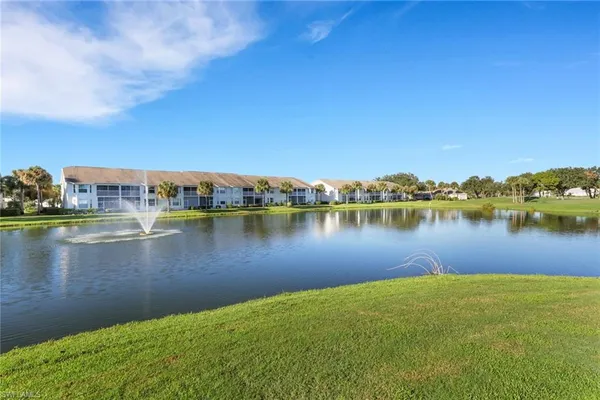 a view of a lake with a city
