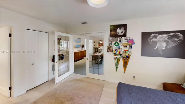 a living room with furniture and window