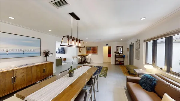 a kitchen with stainless steel appliances a stove a refrigerator and a refrigerator