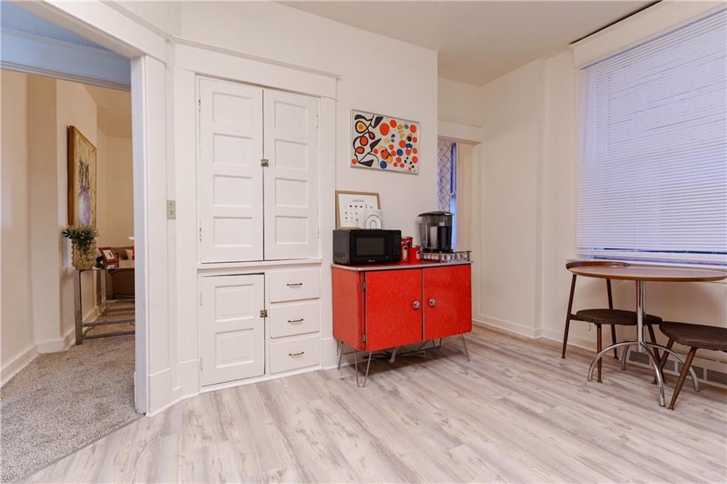 17 Bailey Avenue Pittsburgh, PA 15211 - Photo 13 of 22 a view of a room with furniture and wooden floor
