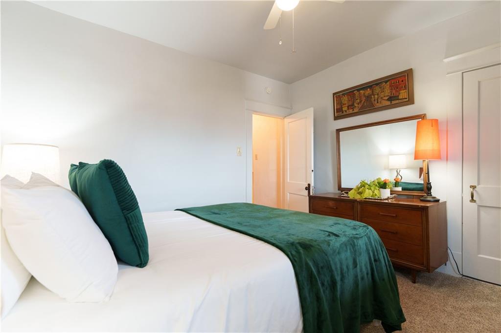 17 Bailey Avenue Pittsburgh, PA 15211 - Photo 16 of 22 a bedroom with a bed and a large window