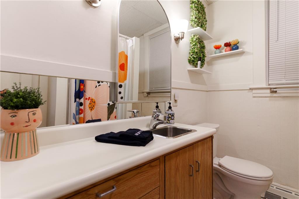 17 Bailey Avenue Pittsburgh, PA 15211 - Photo 17 of 22 a bathroom with a sink and a toilet