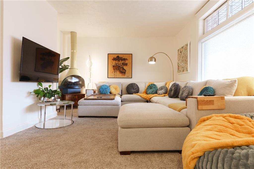 17 Bailey Avenue Pittsburgh, PA 15211 - Photo 4 of 22 a living room with furniture and a flat screen tv