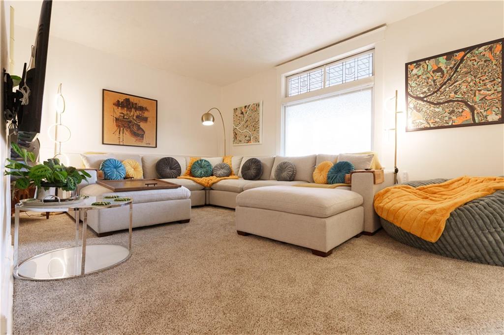 17 Bailey Avenue Pittsburgh, PA 15211 - Photo 5 of 22 a living room with furniture and a large window