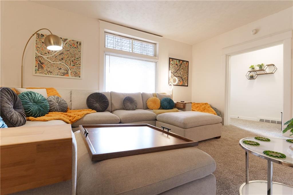17 Bailey Avenue Pittsburgh, PA 15211 - Photo 6 of 22 a living room with furniture and a window
