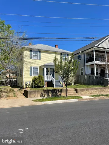 a view of a house with a swimming pool
