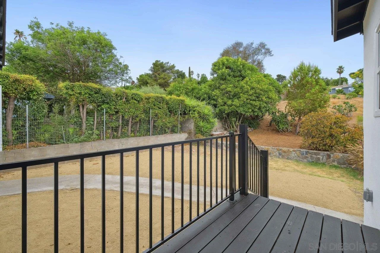 4741 Maple Avenue La Mesa, CA 91942 - Photo 25 of 34 a balcony with trees in front of it