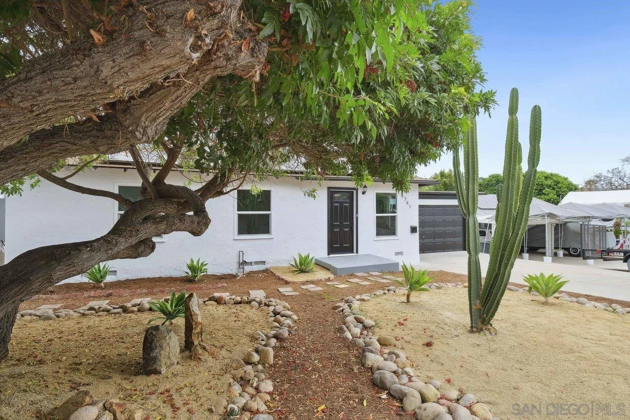 4741 Maple Avenue La Mesa, CA 91942 - Photo 3 of 34 a view of a house with a snow in the yard