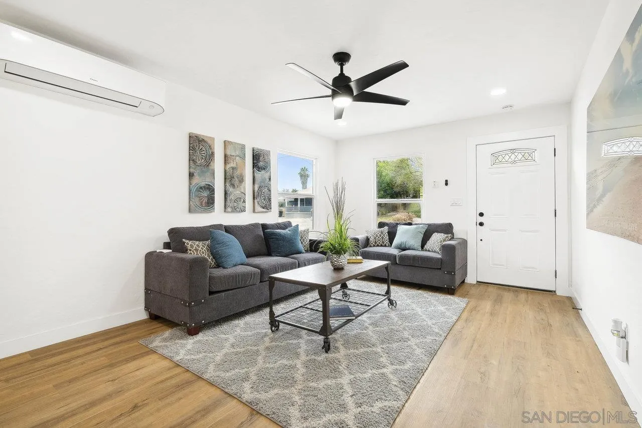 4741 Maple Avenue La Mesa, CA 91942 - Photo 7 of 34 a living room with furniture and a large window