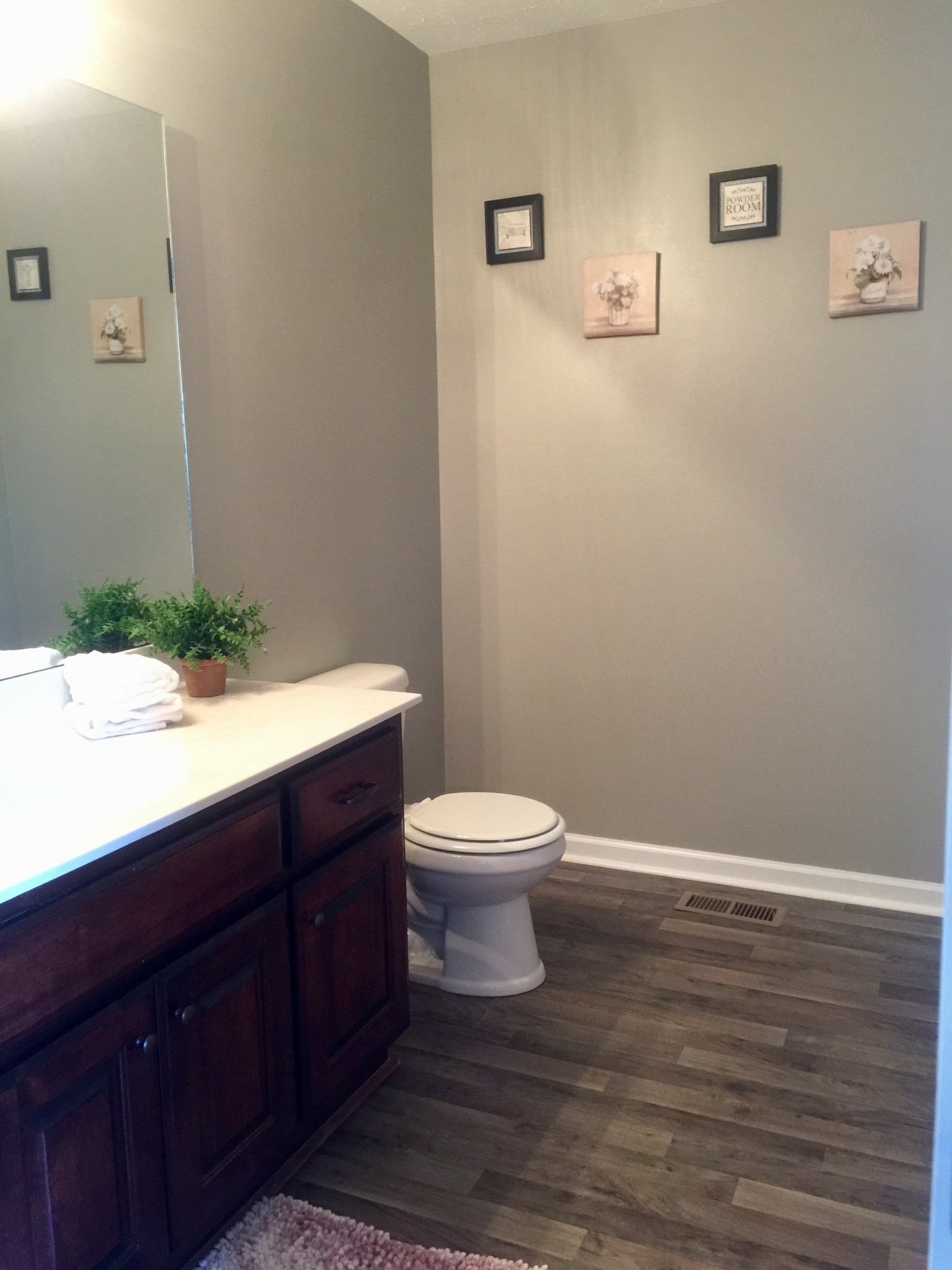 63 Robertson Hollow Road Taft, TN 38488 - Photo 12 of 16 a bathroom with a sink a toilet and mirror