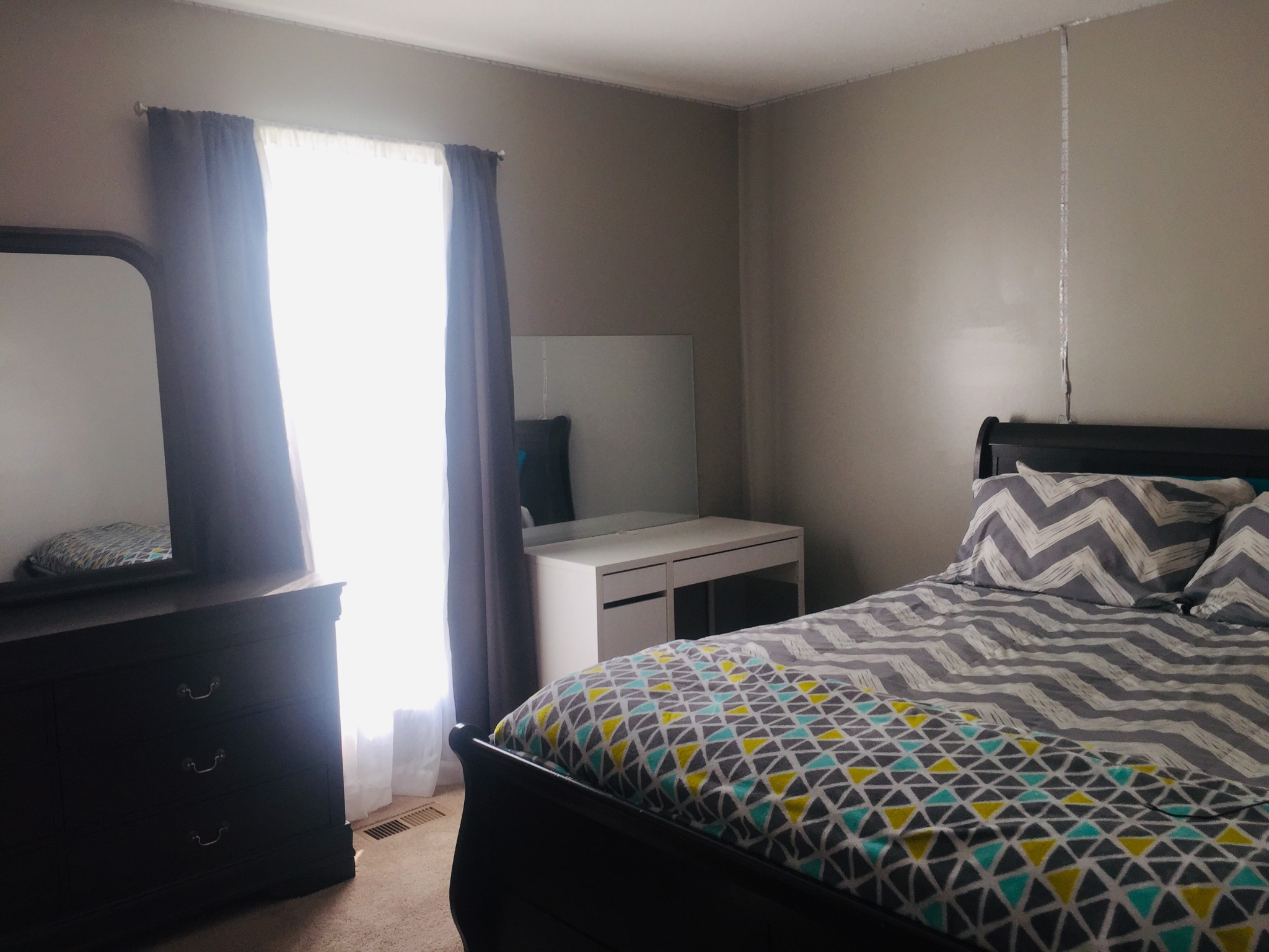 63 Robertson Hollow Road Taft, TN 38488 - Photo 13 of 16 a bedroom with a bed and a window
