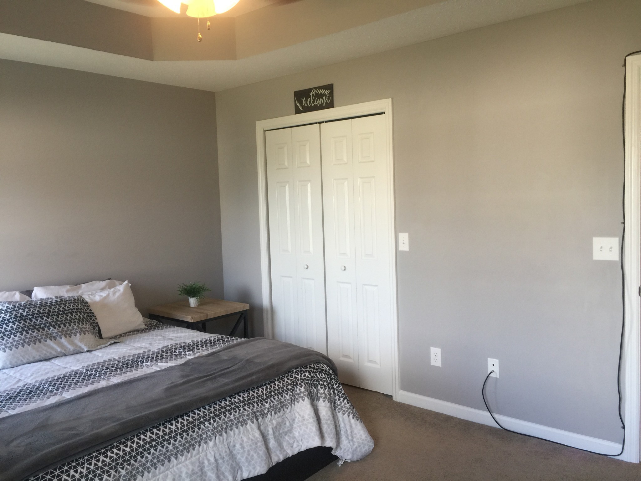 63 Robertson Hollow Road Taft, TN 38488 - Photo 10 of 16 a bedroom with a bed and a window