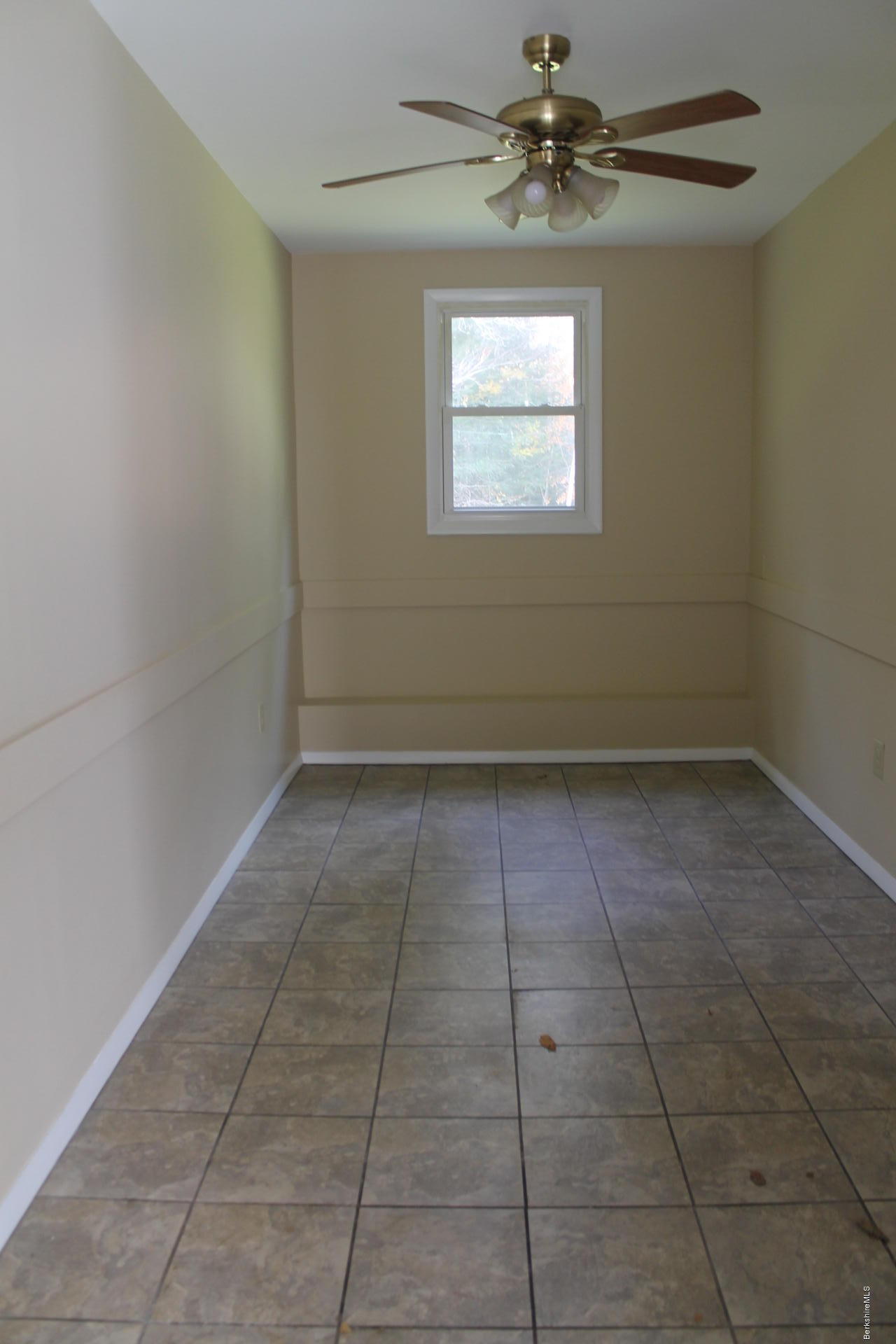 986 Middle Road Clarksburg, MA 01247 - Photo 8 of 20 a view of an empty room with a window