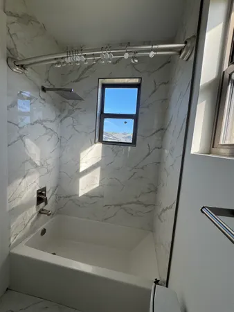 a view of a kitchen with a sink