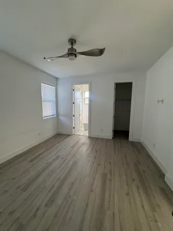 a bathroom with a shower and a tub