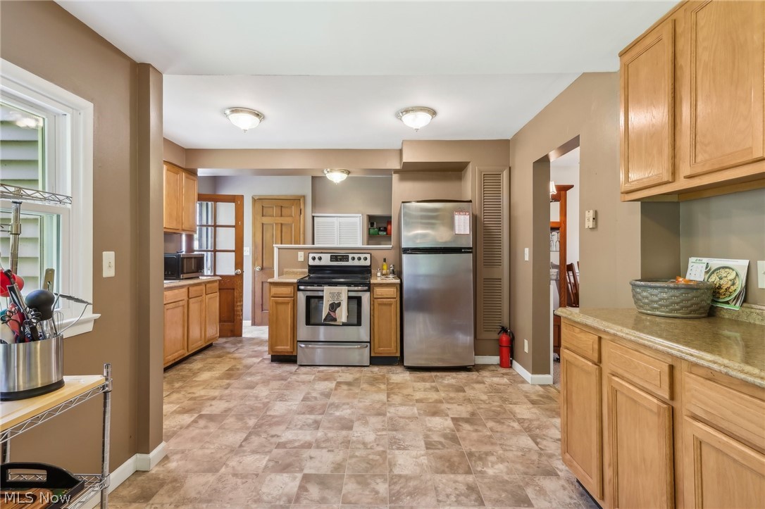 7955 Munson Road Mentor, OH 44060 - Photo 19 of 47 Oversized kitchen with laundry access.