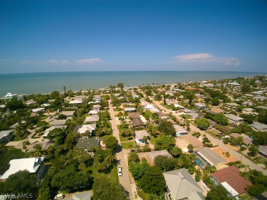 151 Mandalay Road Fort Myers Beach, FL 33931 - Photo 2 of 32 an aerial view of multiple house