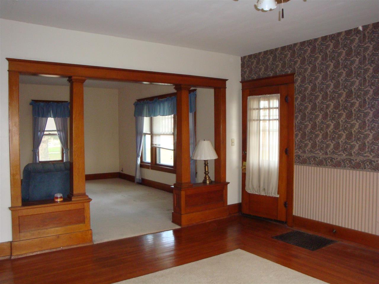 8701 Squaw Prairie Road Garden Prairie, IL 61038 - Photo 4 of 28 a view of livingroom with furniture and wooden floor