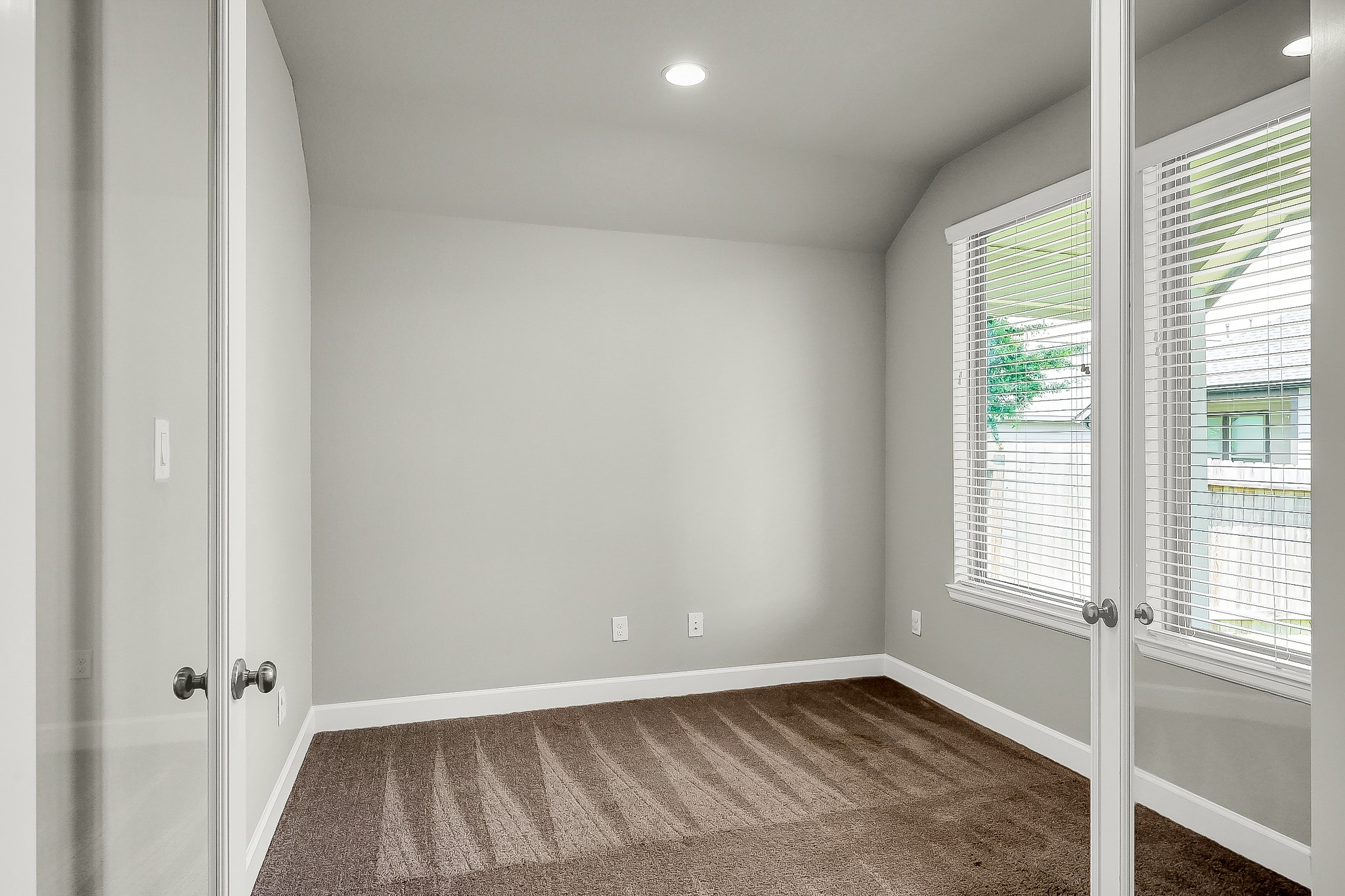 328 Rise Lane Montgomery, TX 77316 - Photo 11 of 49 a view of an empty room with a window