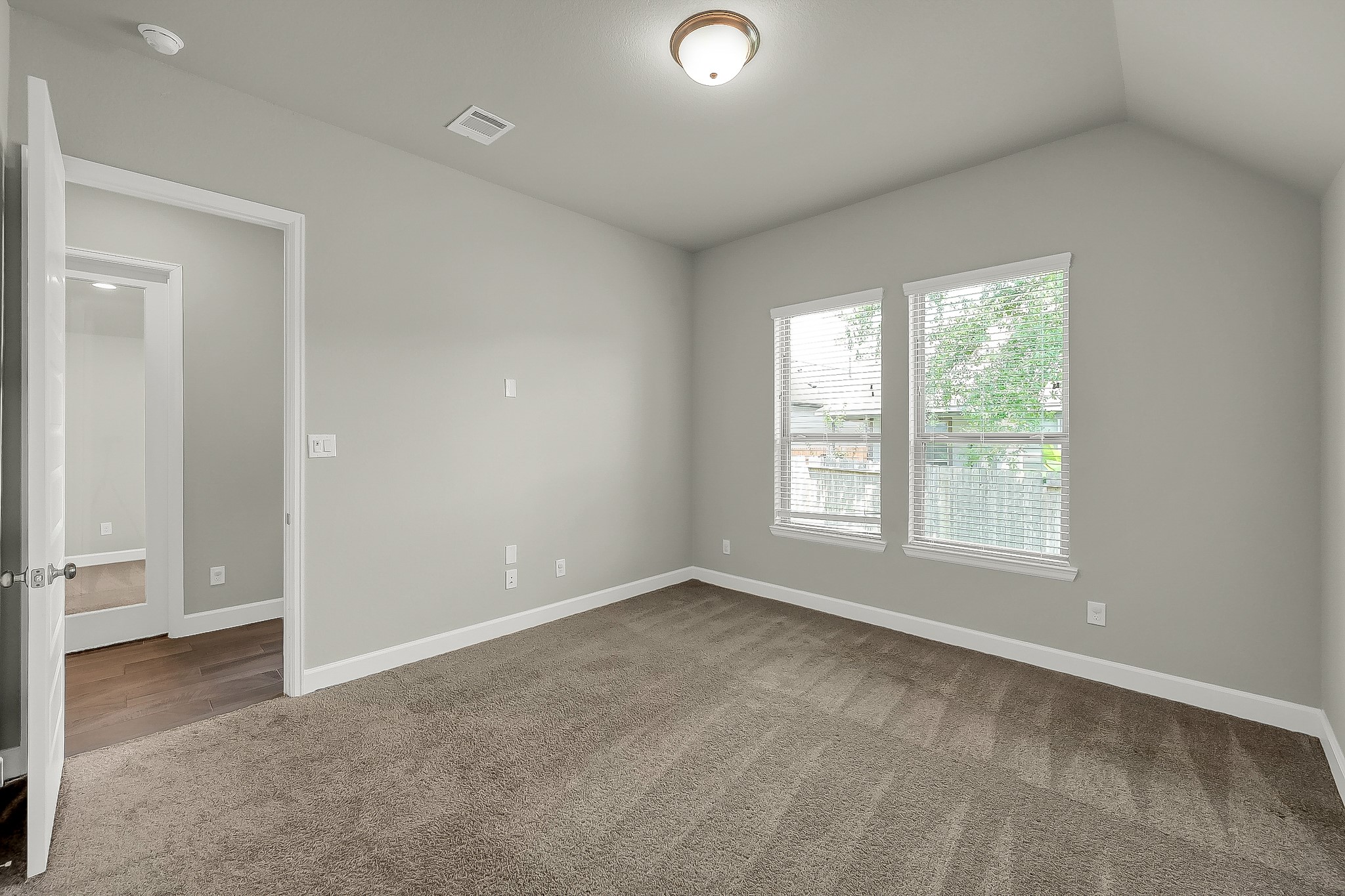 328 Rise Lane Montgomery, TX 77316 - Photo 27 of 49 an empty room with windows and closet