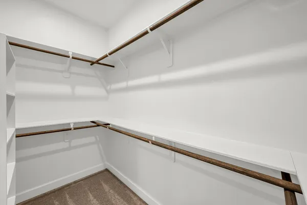 a view of a room with racks on the wall