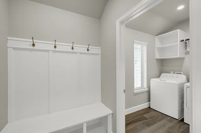 a view of room with hallway and closet