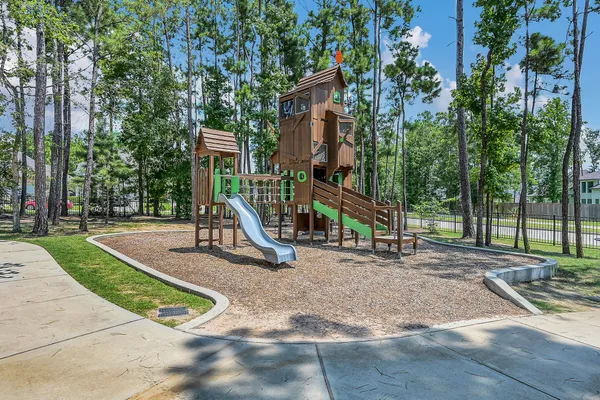 a view of a park with swings