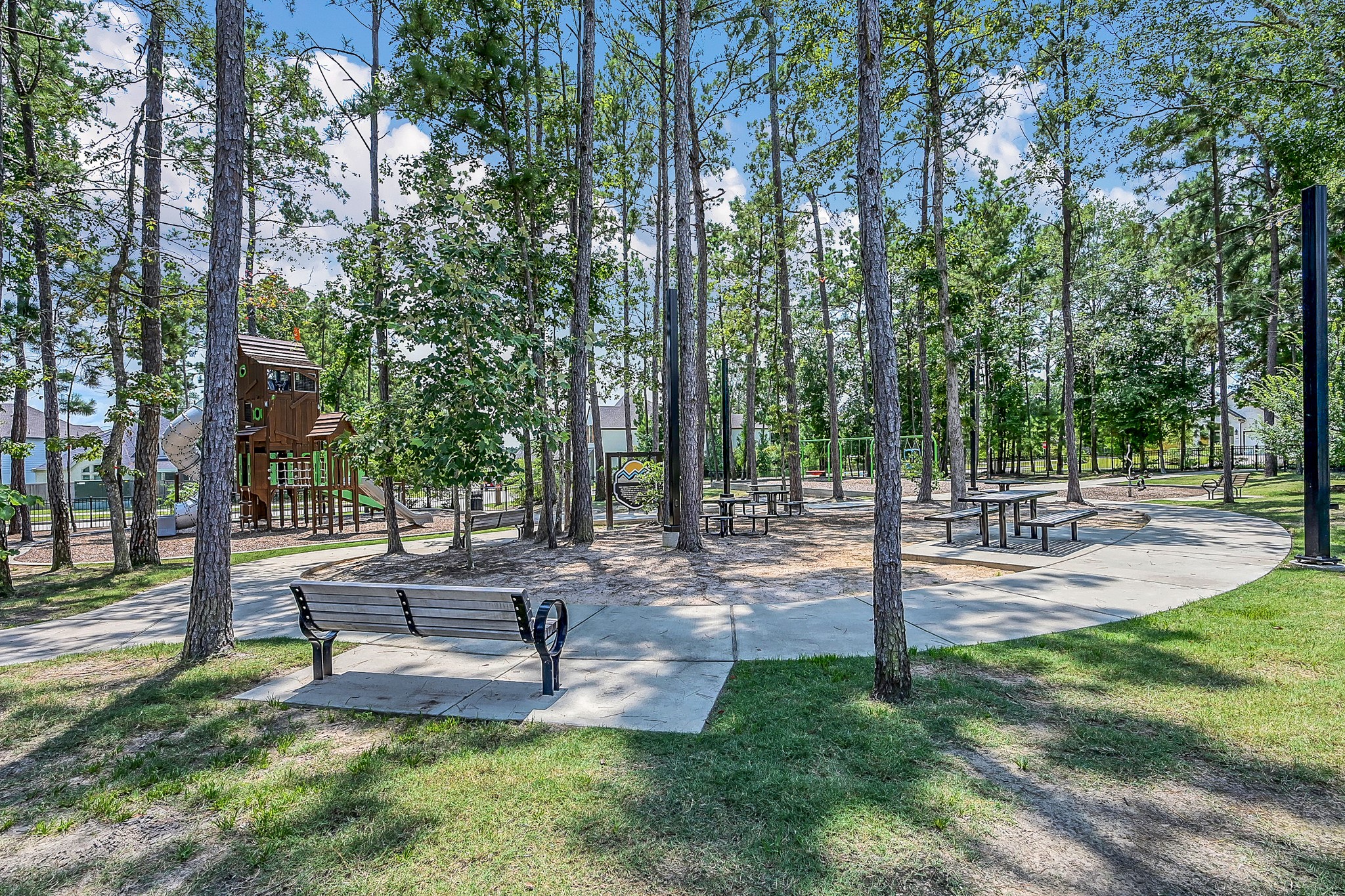 328 Rise Lane Montgomery, TX 77316 - Photo 45 of 49 a view of a park with bench