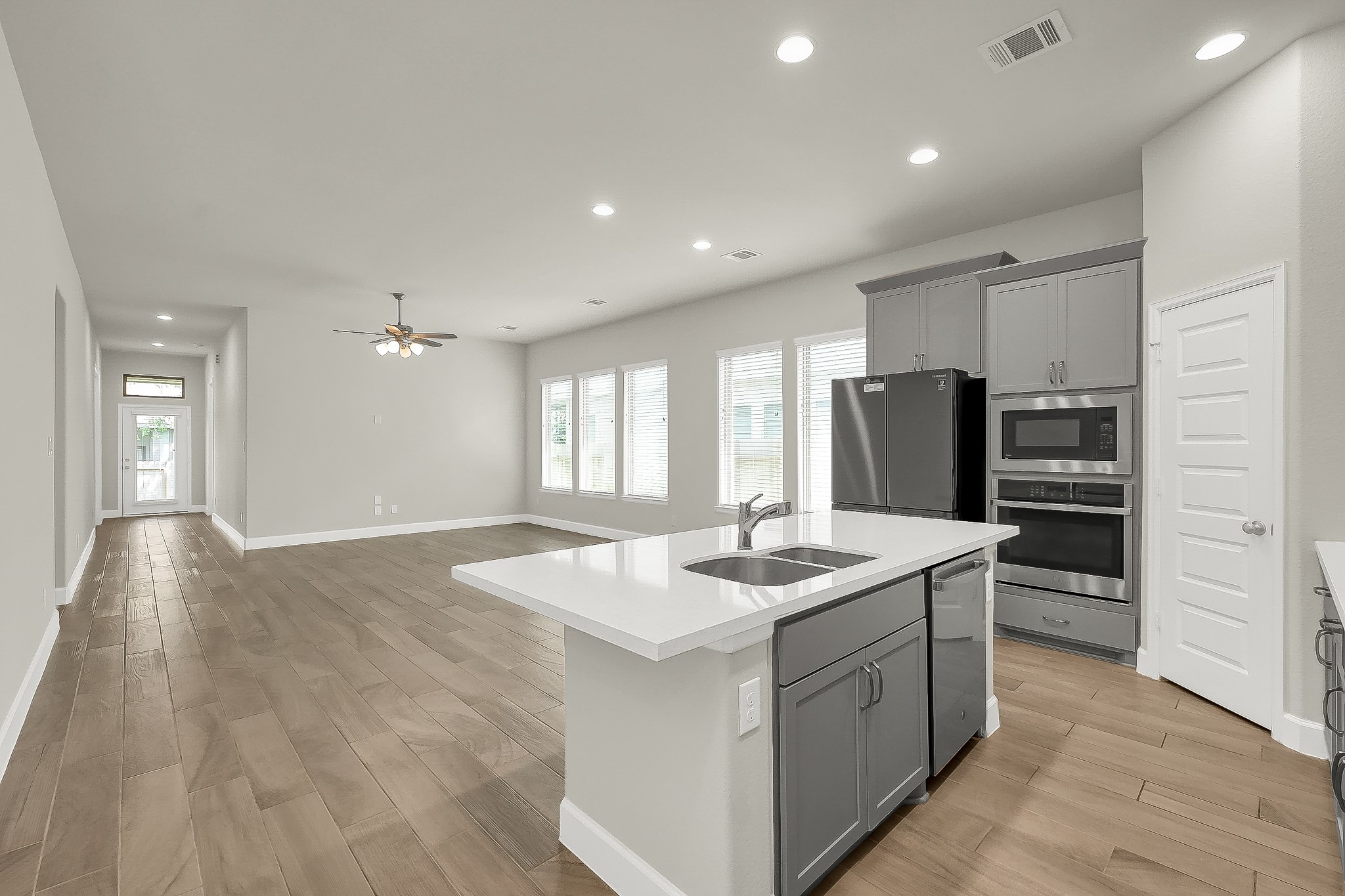 328 Rise Lane Montgomery, TX 77316 - Photo 6 of 49 a kitchen with stainless steel appliances granite countertop a sink stove and refrigerator
