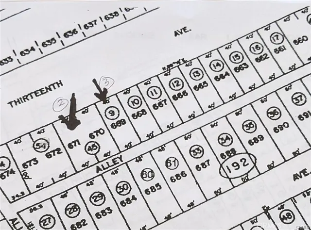 a view of a bench and a picture on the wall