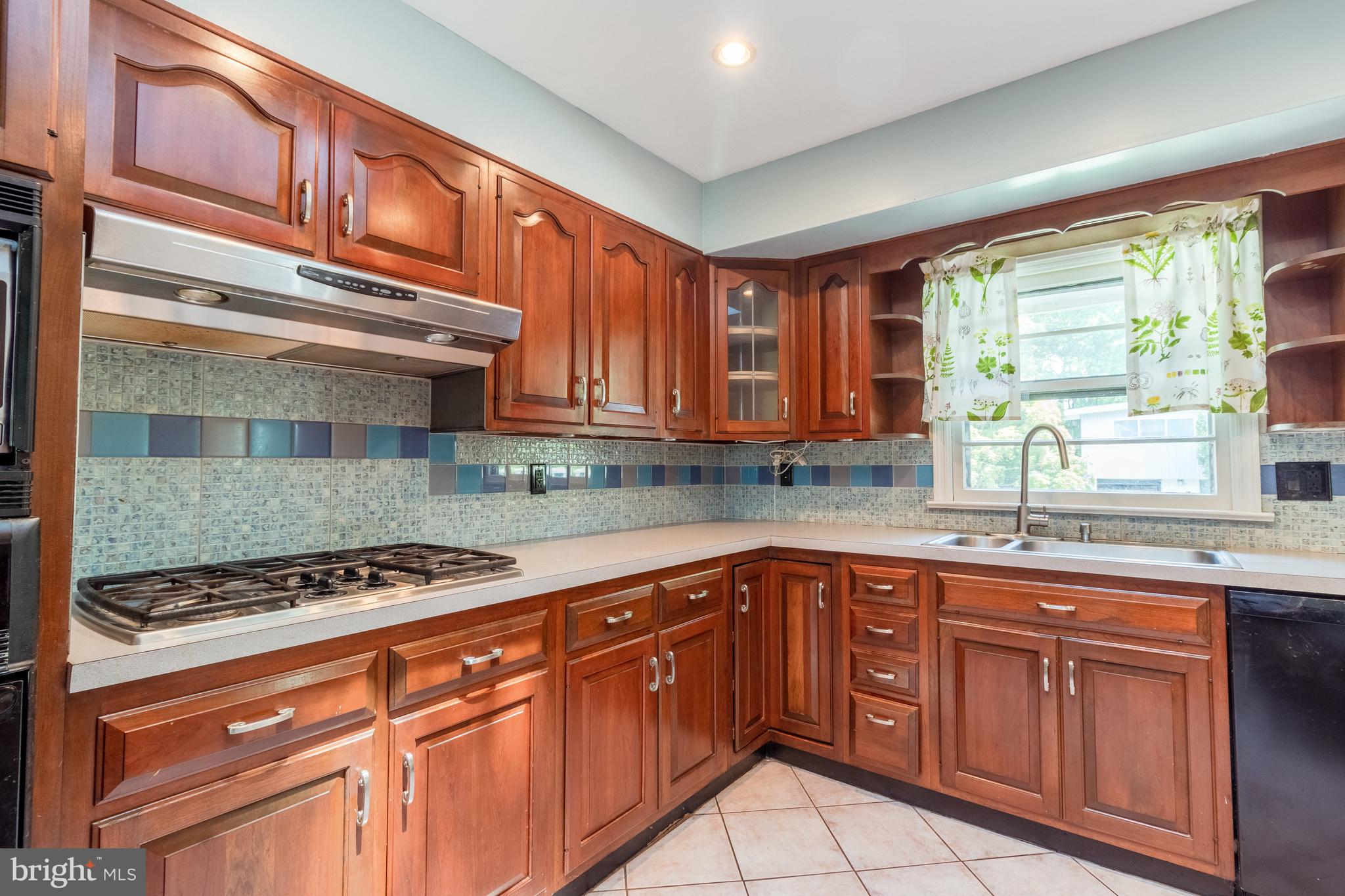 1420 Athens Road Wilmington, DE 19803 - Photo 8 of 23 Kitchen features tiled back splash