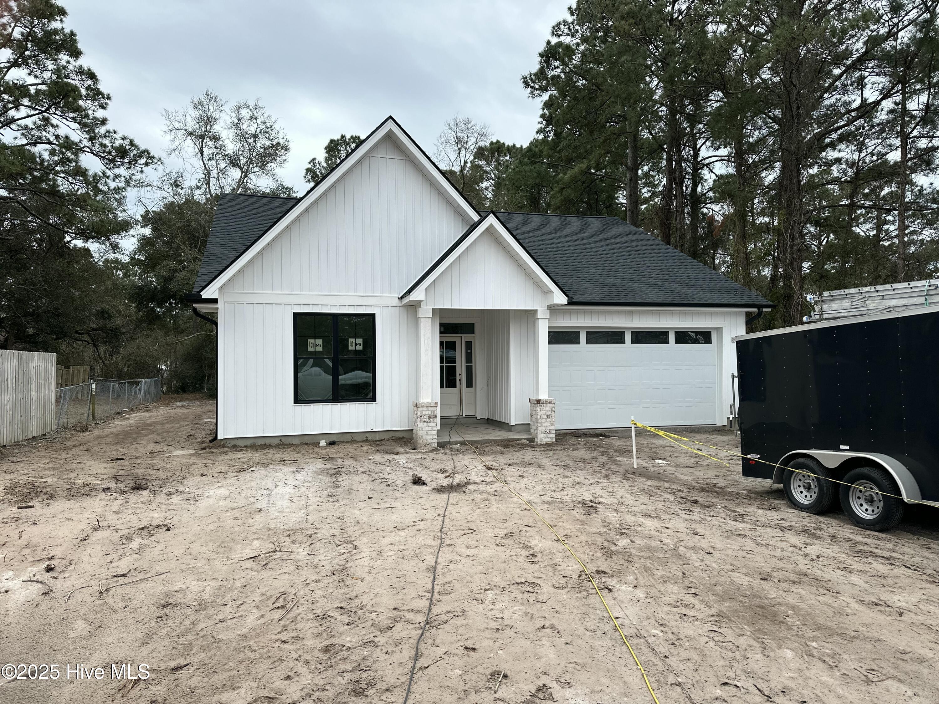 1857 Seashore Road Southwest Supply, NC 28462 - Photo 1 of 5 Front
