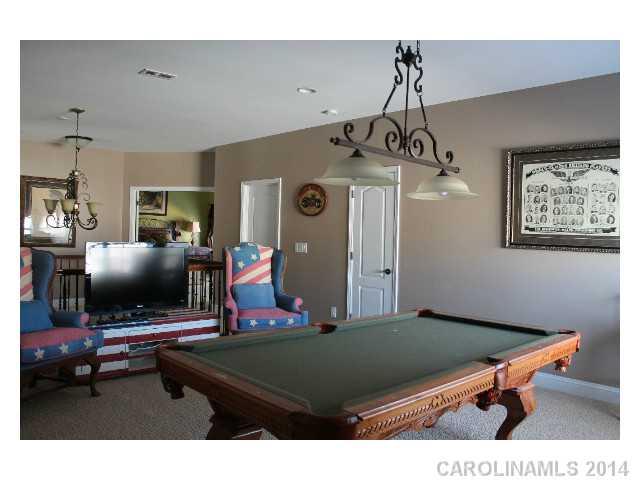 573 Quicksilver Trail Fort Mill, SC 29708 - Photo 12 of 16 a living room with furniture and a flat screen tv