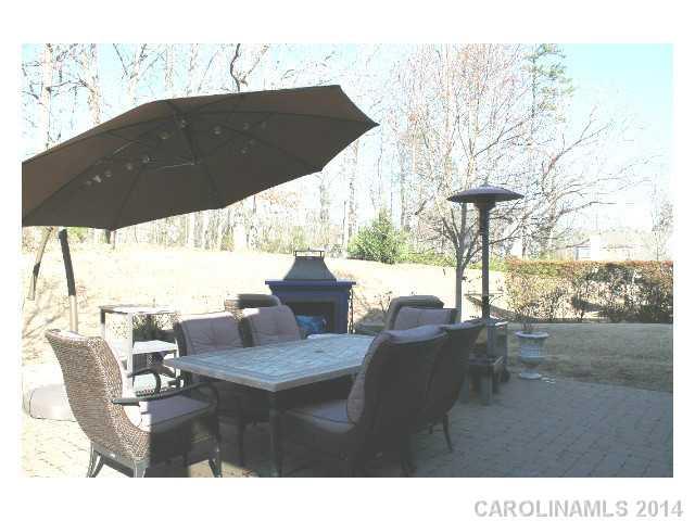 573 Quicksilver Trail Fort Mill, SC 29708 - Photo 15 of 16 a view of an outdoor dining space with furniture