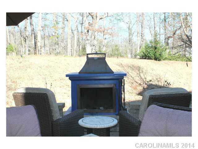 573 Quicksilver Trail Fort Mill, SC 29708 - Photo 16 of 16 a living room with furniture and a fireplace