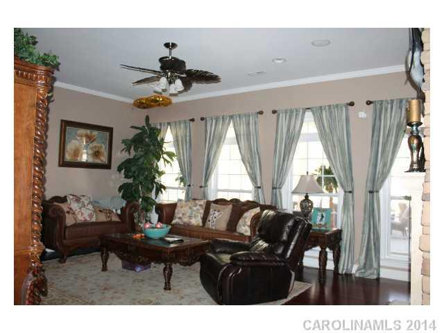 573 Quicksilver Trail Fort Mill, SC 29708 - Photo 3 of 16 a living room with furniture and a large window