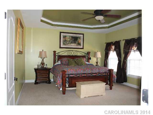 573 Quicksilver Trail Fort Mill, SC 29708 - Photo 10 of 16 a bedroom with a bed and window
