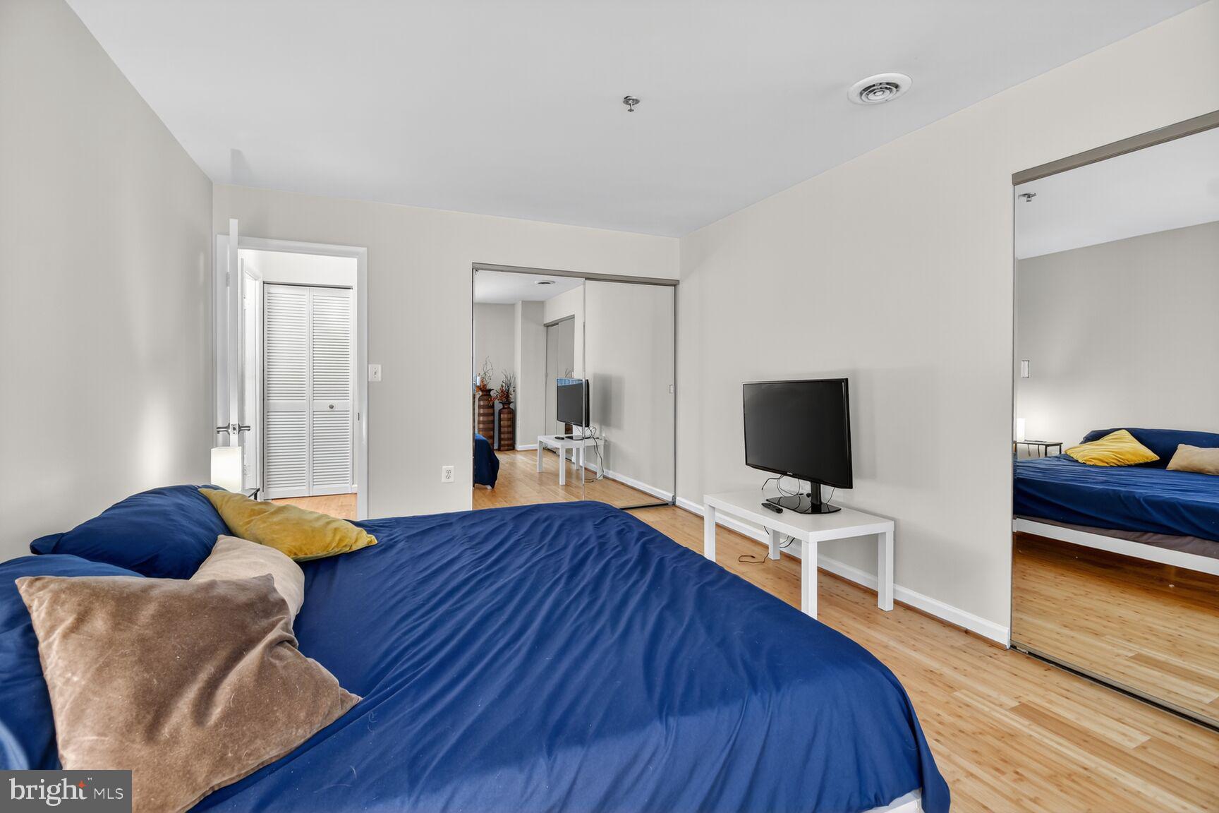 1001 North Vermont Street, Unit 102 Arlington, VA 22201 - Photo 11 of 27 a living room with furniture and a flat screen tv