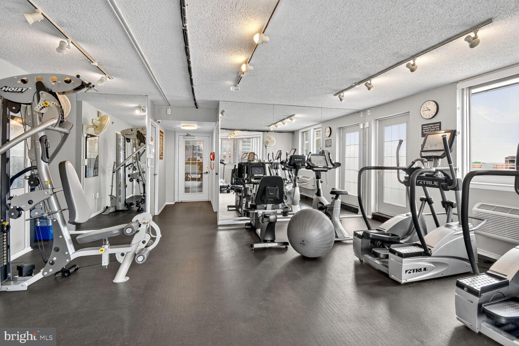 1001 North Vermont Street, Unit 102 Arlington, VA 22201 - Photo 18 of 27 a view of a room with gym equipment