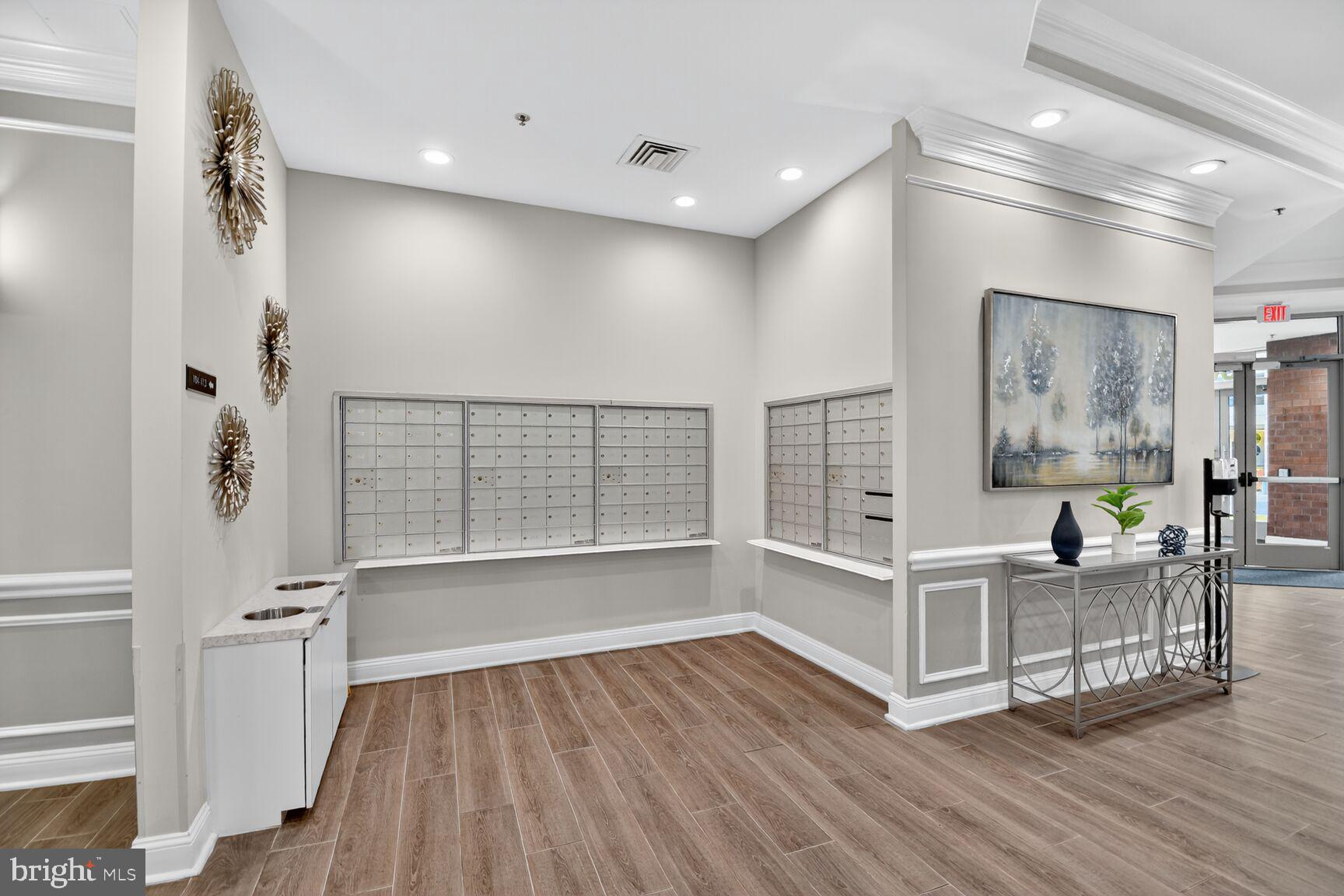 1001 North Vermont Street, Unit 102 Arlington, VA 22201 - Photo 24 of 27 a view of kitchen with furniture and wooden floor